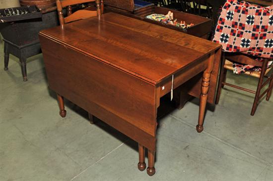 DROPLEAF DINING TABLE. Cherry