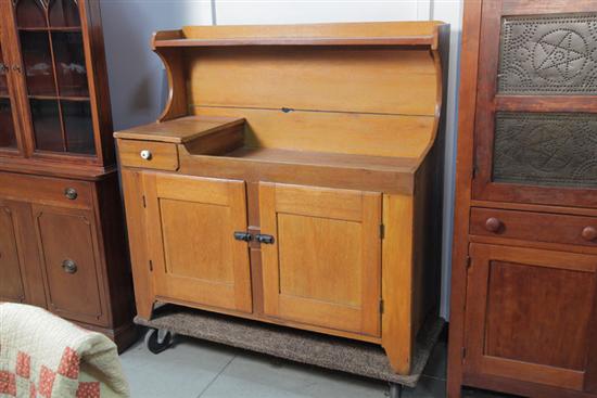 DRY SINK. Two doors surmounted by