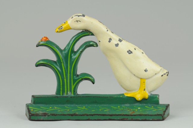 DUCK PECKING LADYBUG DOORSTOP