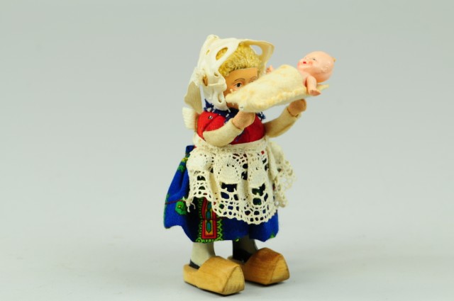 DUTCH GIRL HOLDING BABY Schuco