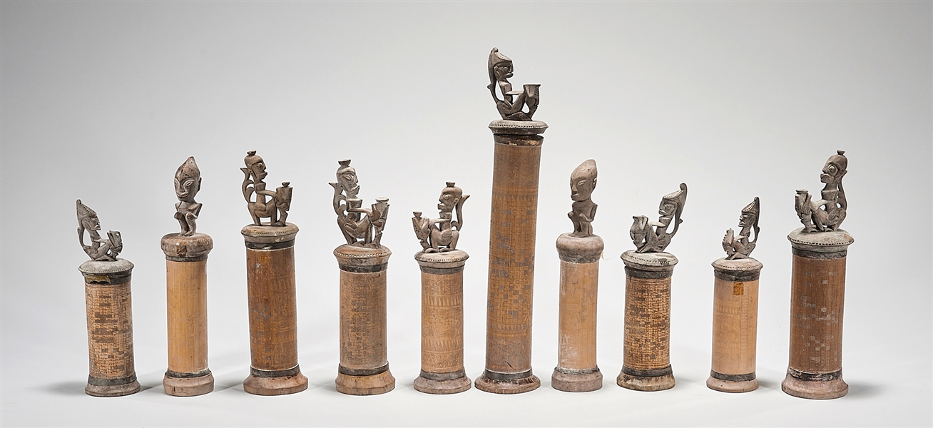 each with figural finial; bodies