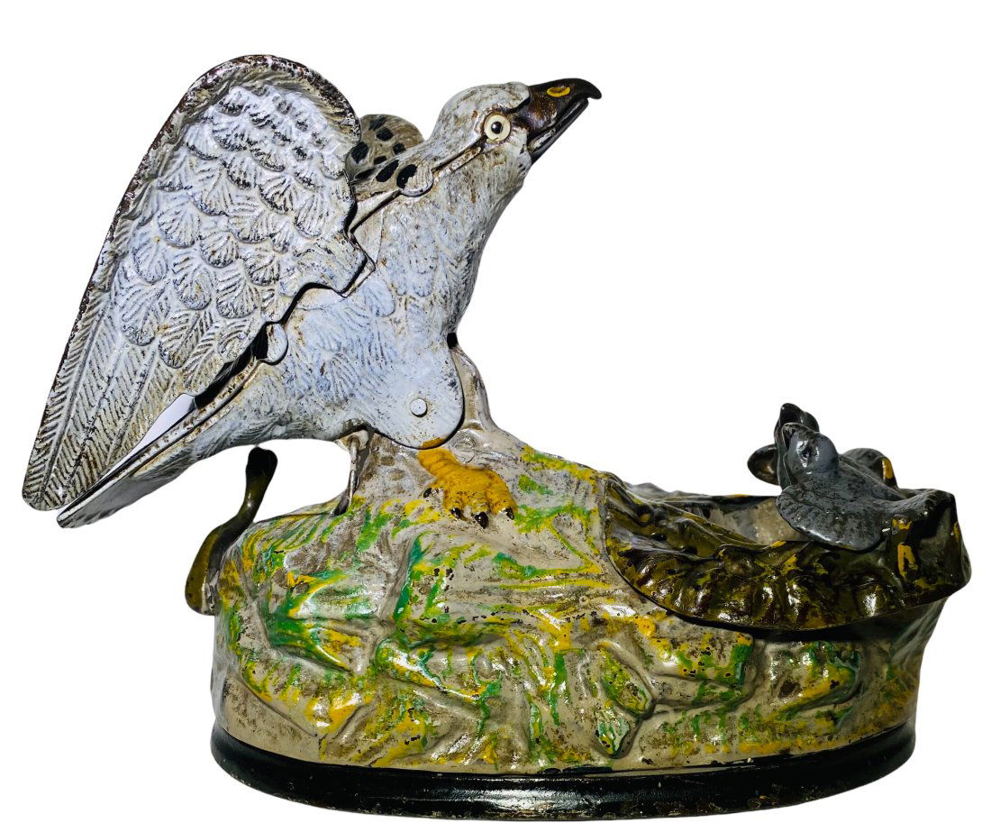 EAGLE AND EAGLETS MECHANICAL BANK -