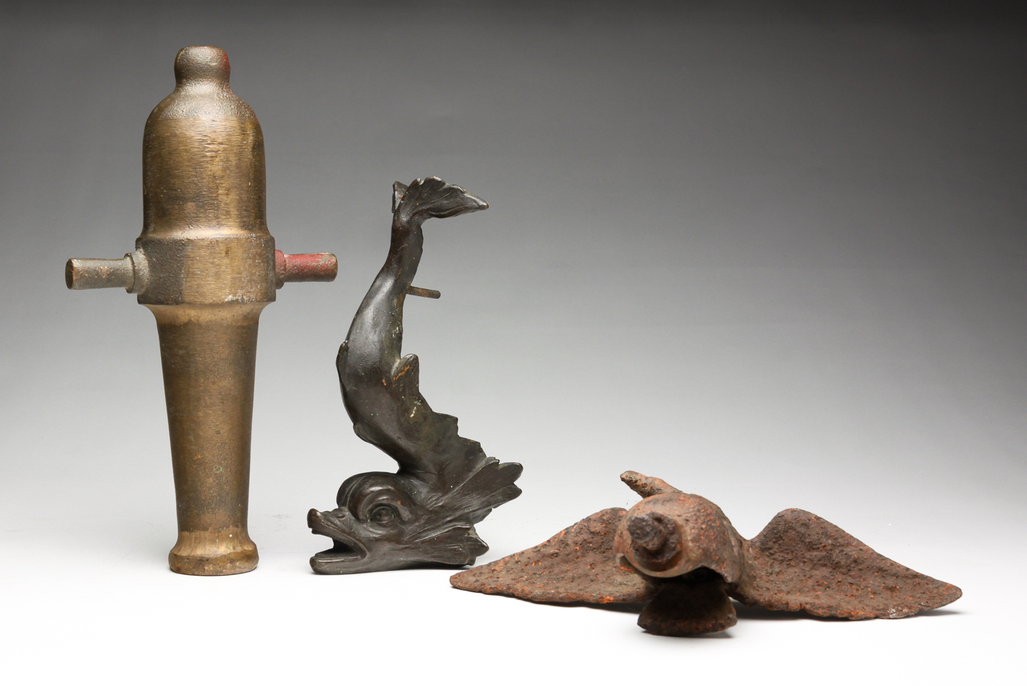 EAGLE, CANNON AND DOLPHIN.