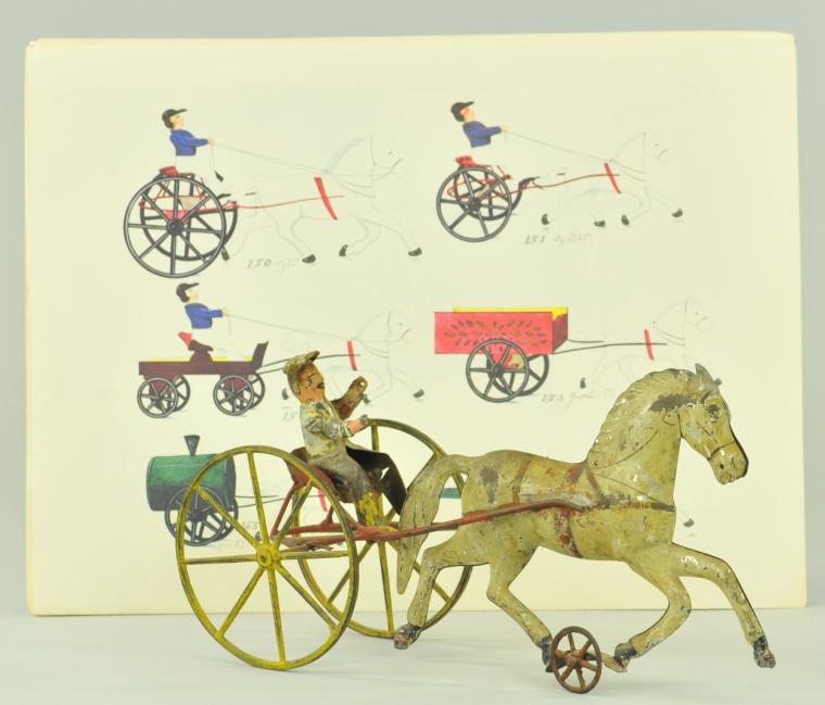 EARLY AMERICAN TIN SULKY TOY
