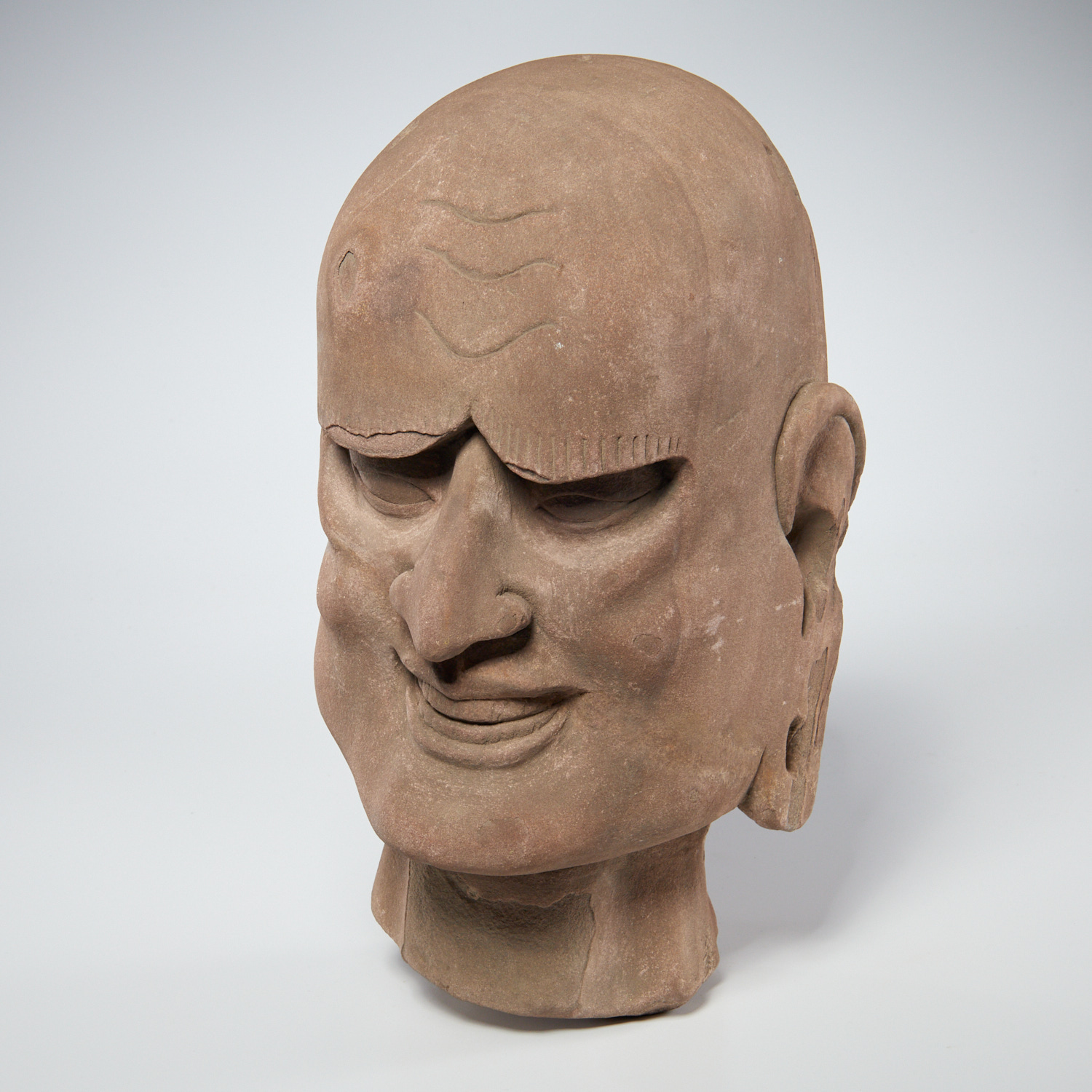 EARLY ASIAN CARVED STONE LUOHAN