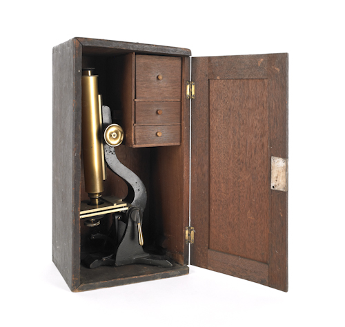 Early brass microscope with