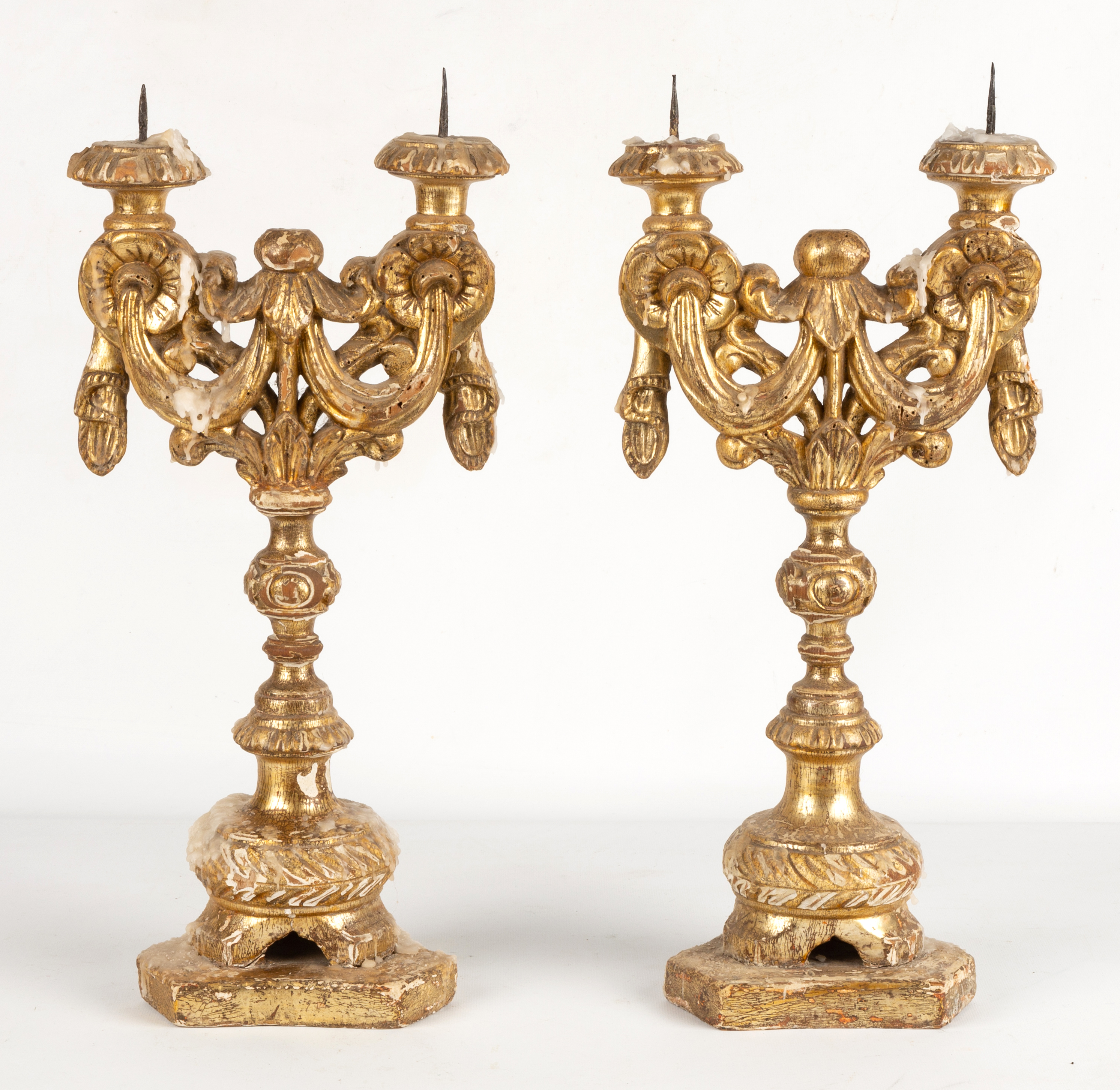 EARLY CARVED GILTWOOD PRICKETS