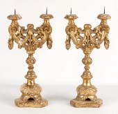 EARLY CARVED GILTWOOD PRICKETS