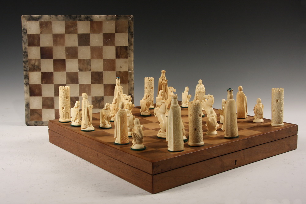 EARLY CARVED IVORY CHESS SET W