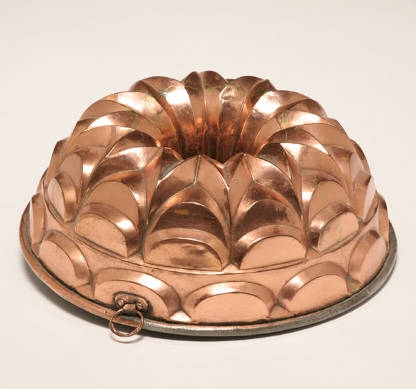 Early copper food mold; American