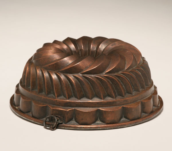 Early copper food mold; tin