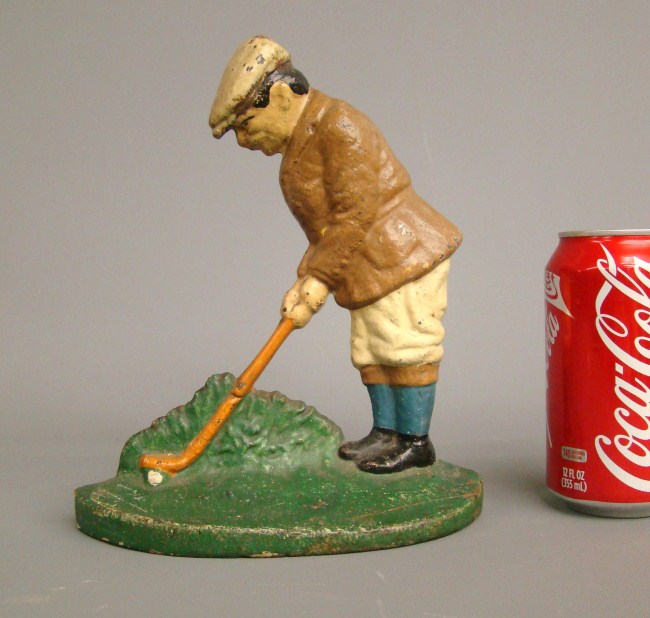 Early Hubley golfer doorstop. 7'' W