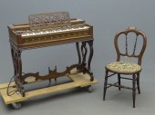 Early melodian and chair.