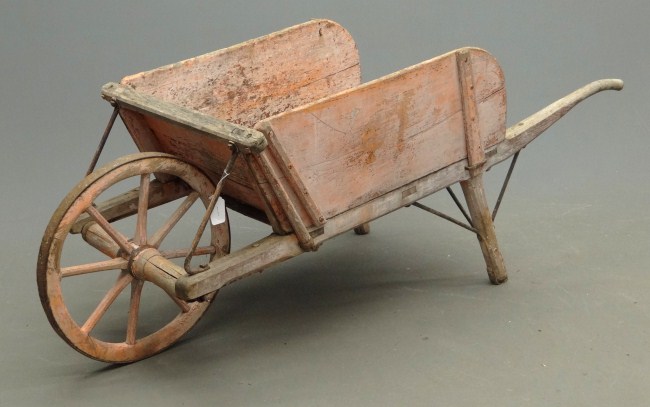 Early painted wheelbarrow. 72'