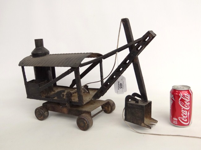 Early pressed steel steam shovel.