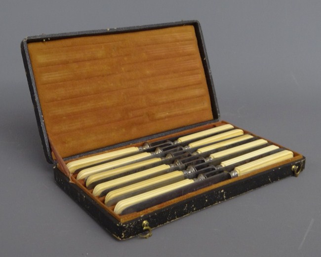 Early set of boxed knives.