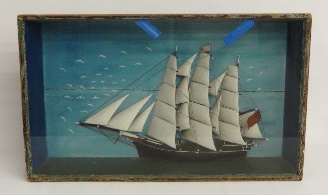 Early ship diorama. Glass