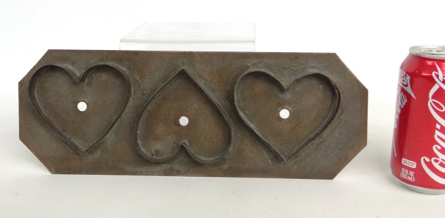 Early tin heart mold. 13'' Length.