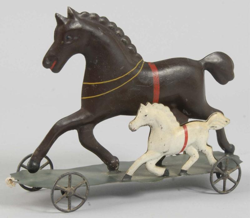 Early Tin Horse Platform Toy. 