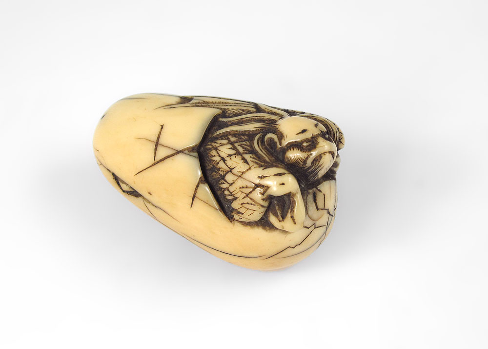 EARLY UNUSUAL IVORY NETSUKE: Baby