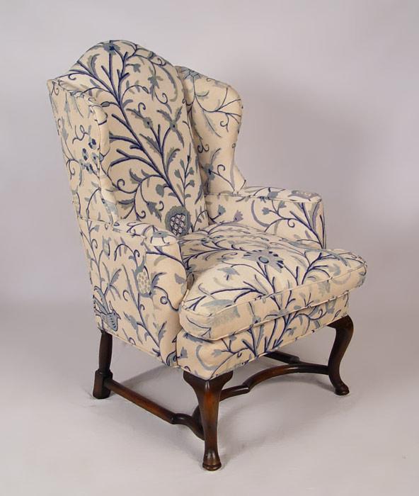 EARLY WINGBACK CHAIR UPHOLSTERED IN