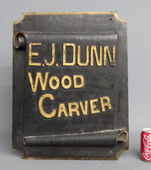 Early wooden sign ''E.J. Dunn