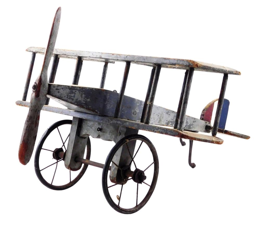 EARLY WOODEN TOY AIRPLANE WITH