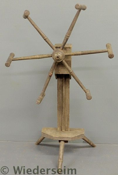 Early wool winder mounted on a