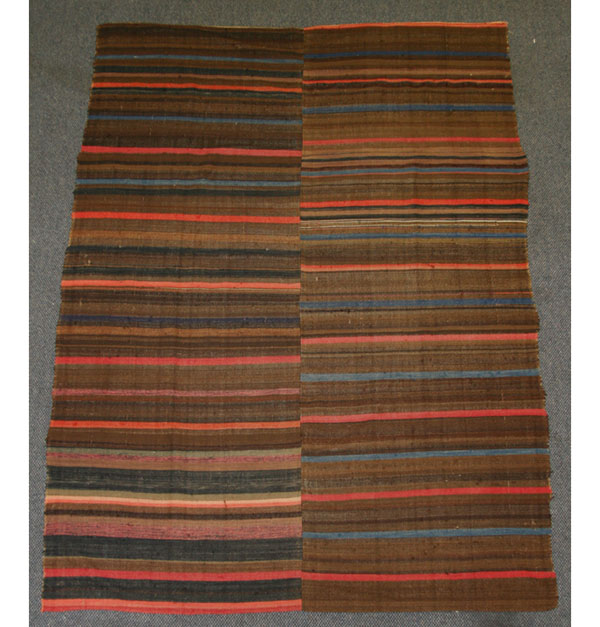 Early woven bed cover.