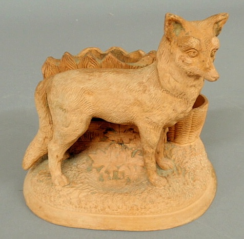 Earthenware planter with a standing