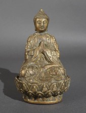 EAST ASIAN PATINATED METAL FIG