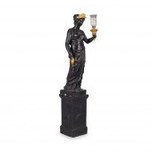 EBONISED PLASTER FIGURAL TORCH