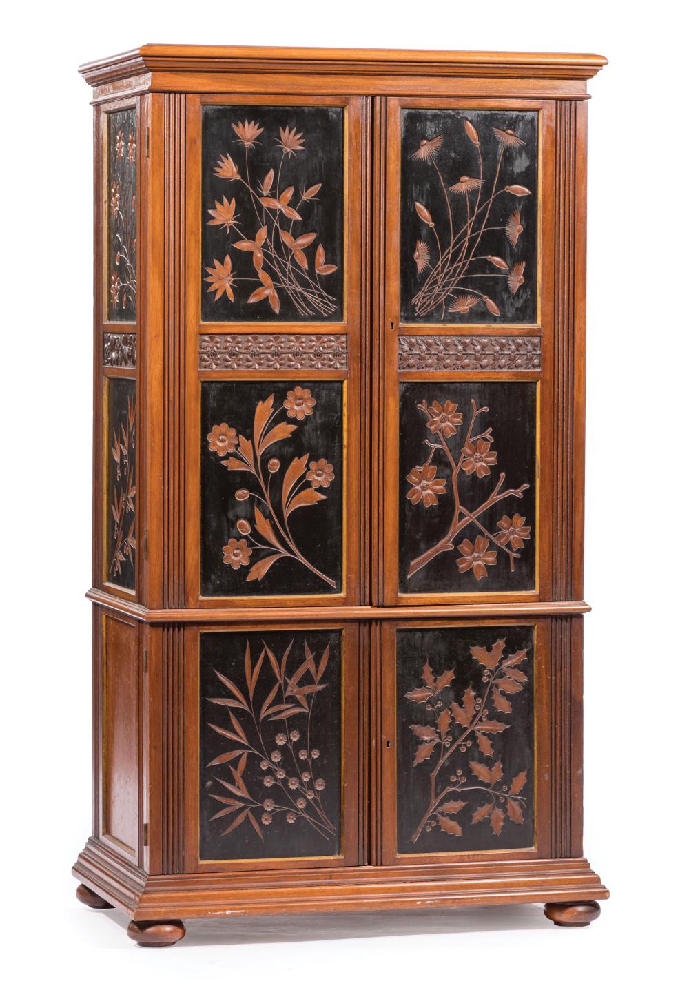 EBONIZED, CARVED AND PARCEL GILT