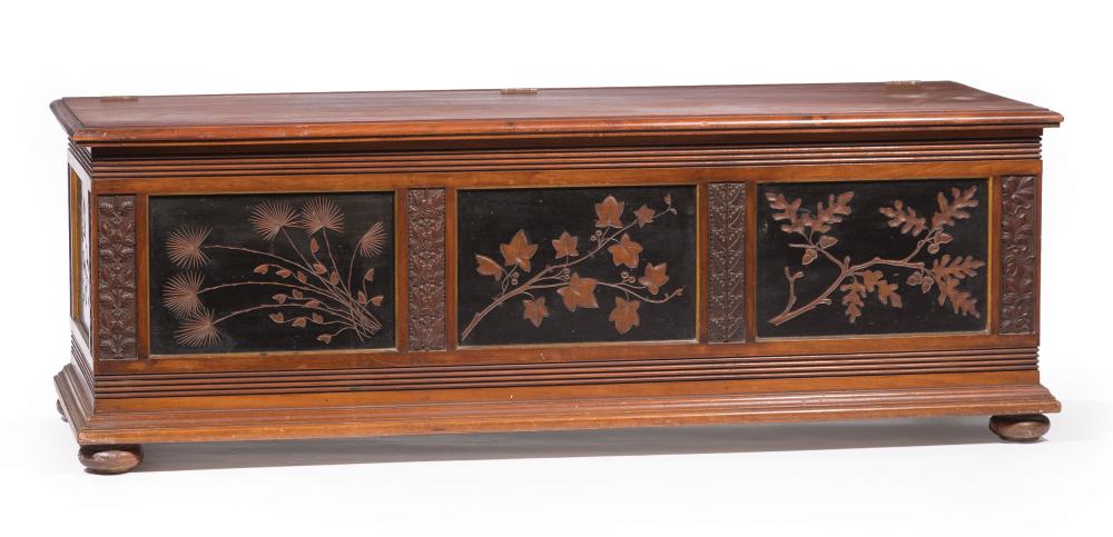 EBONIZED, CARVED AND PARCEL GILT