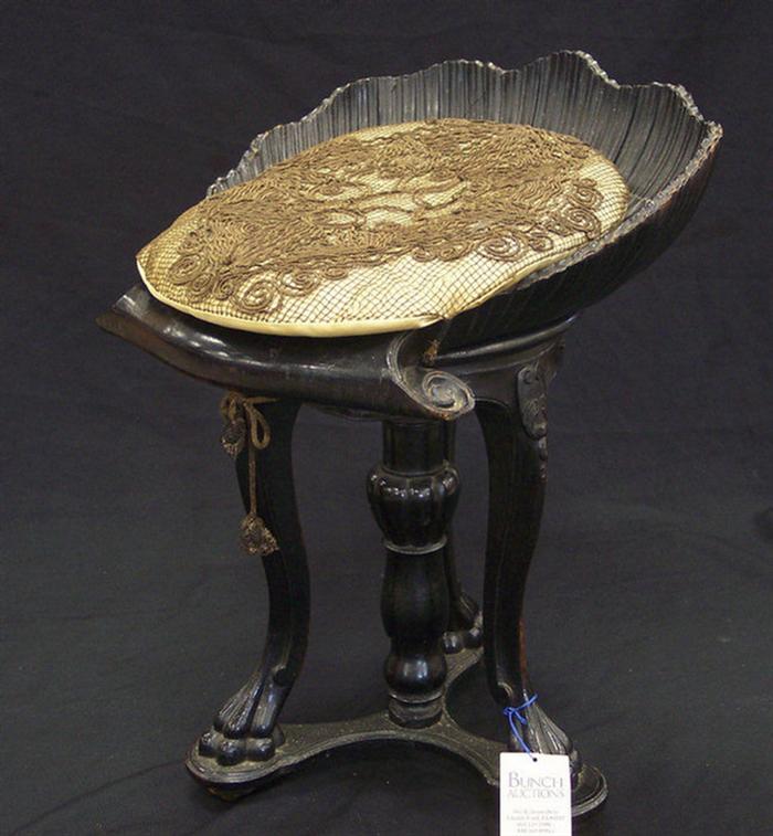 Ebonized carved Continental piano