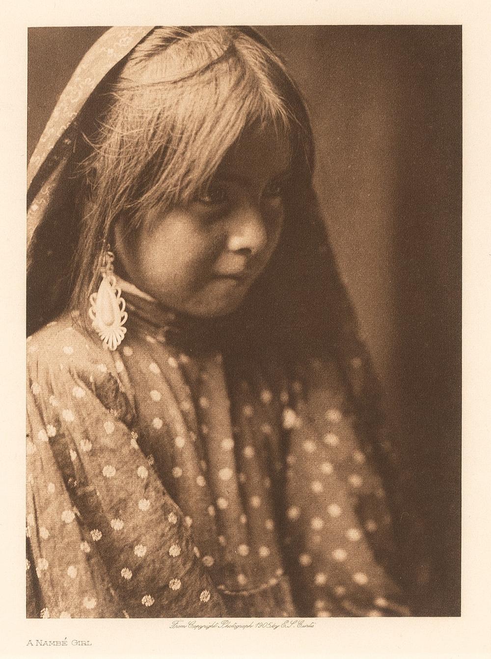 EDWARD S. CURTIS, A NAMBE GIRL,