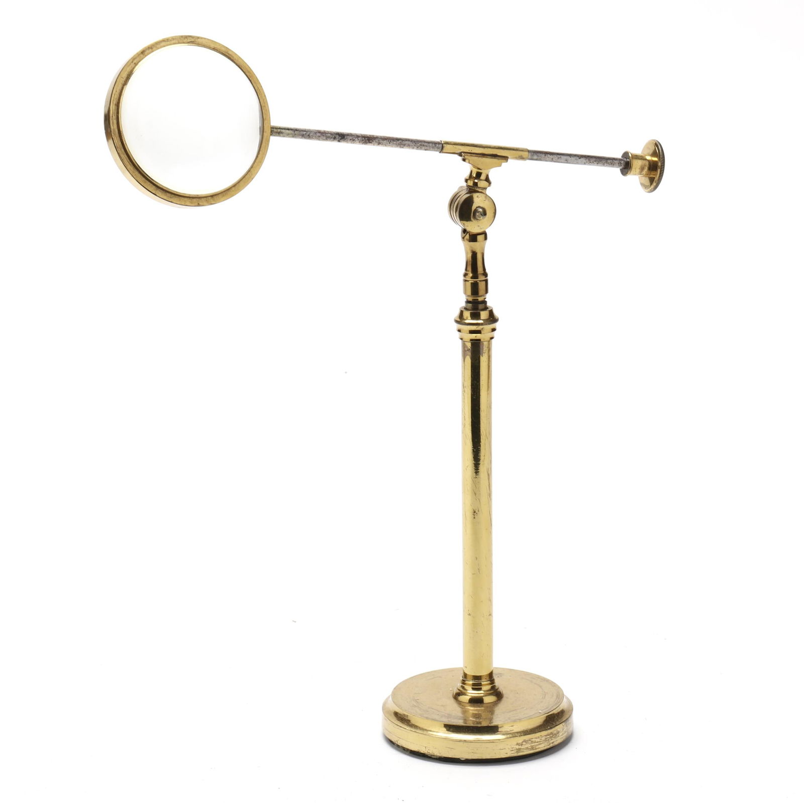 EDWARDIAN BRASS MAGNIFYING GLASS ON