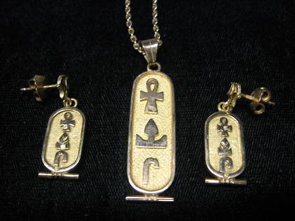 Egyptian motif pendant and earrings