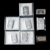 EIGHT .999 FINE SILVER BARS TO