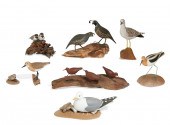 EIGHT AMERICAN PAINTED WOOD MO