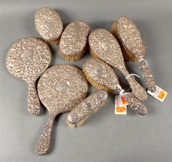 Eight American repousse sterling