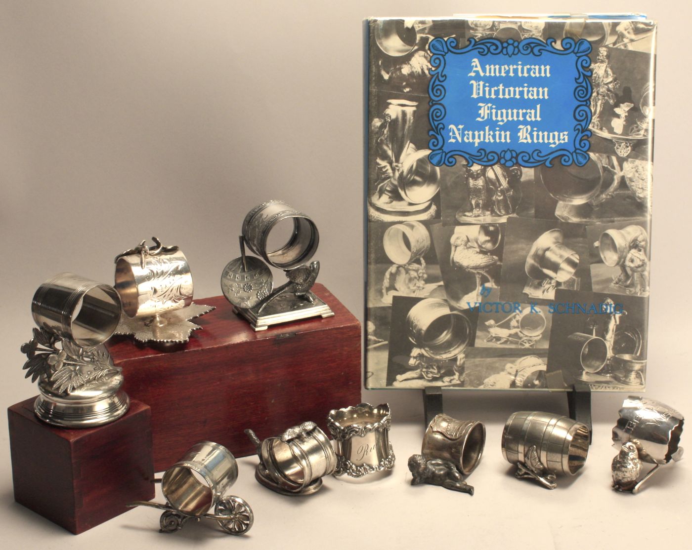 EIGHT ANTIQUE SILVER PLATED FIGURAL