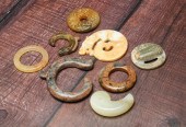 EIGHT ASIAN STONE CARVINGS AND