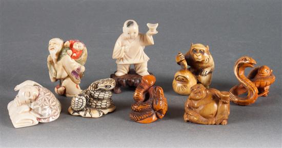 Eight assorted carved and