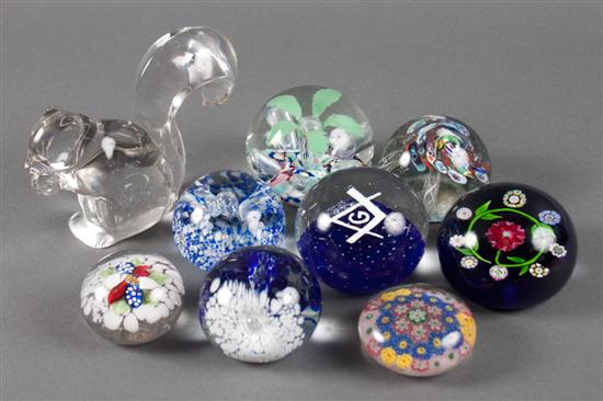 Eight assorted glass paperweights