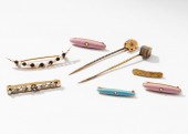 EIGHT ASSORTED YELLOW GOLD PIN