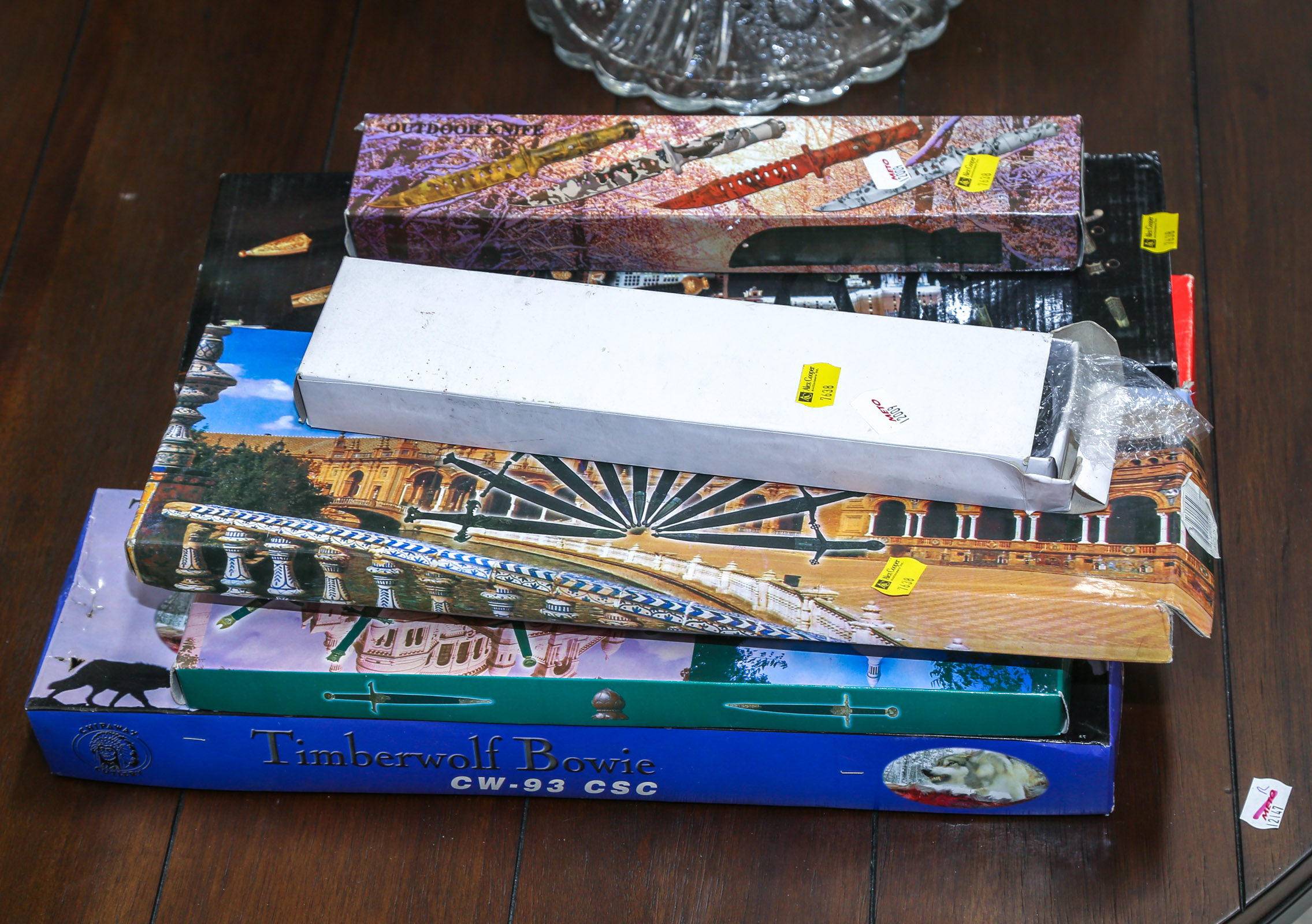 EIGHT BOXED COLLECTORS' KNIVES Made