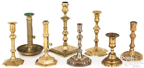 EIGHT BRASS CANDLESTICKS, 18TH