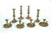 EIGHT BRASS CANDLESTICKS.  Ame