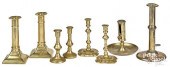 EIGHT BRASS CANDLESTICKS AND T